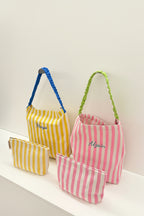 Art stripped canvas shoulder bag