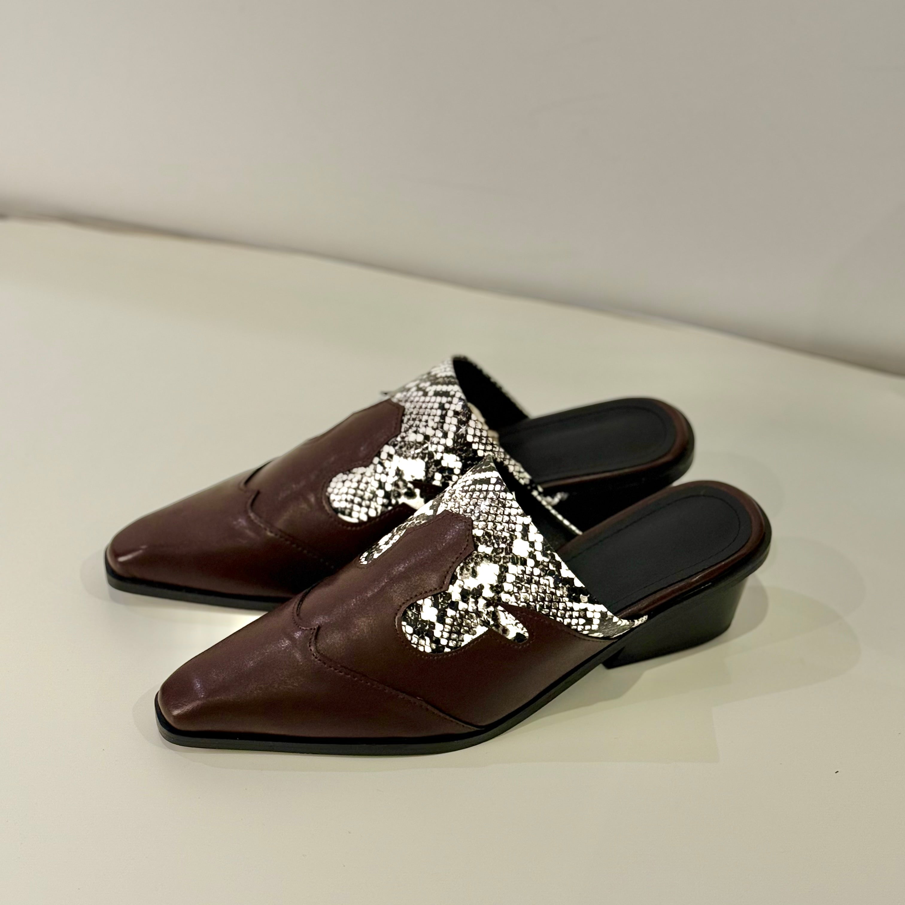 Cowboy style brown mule