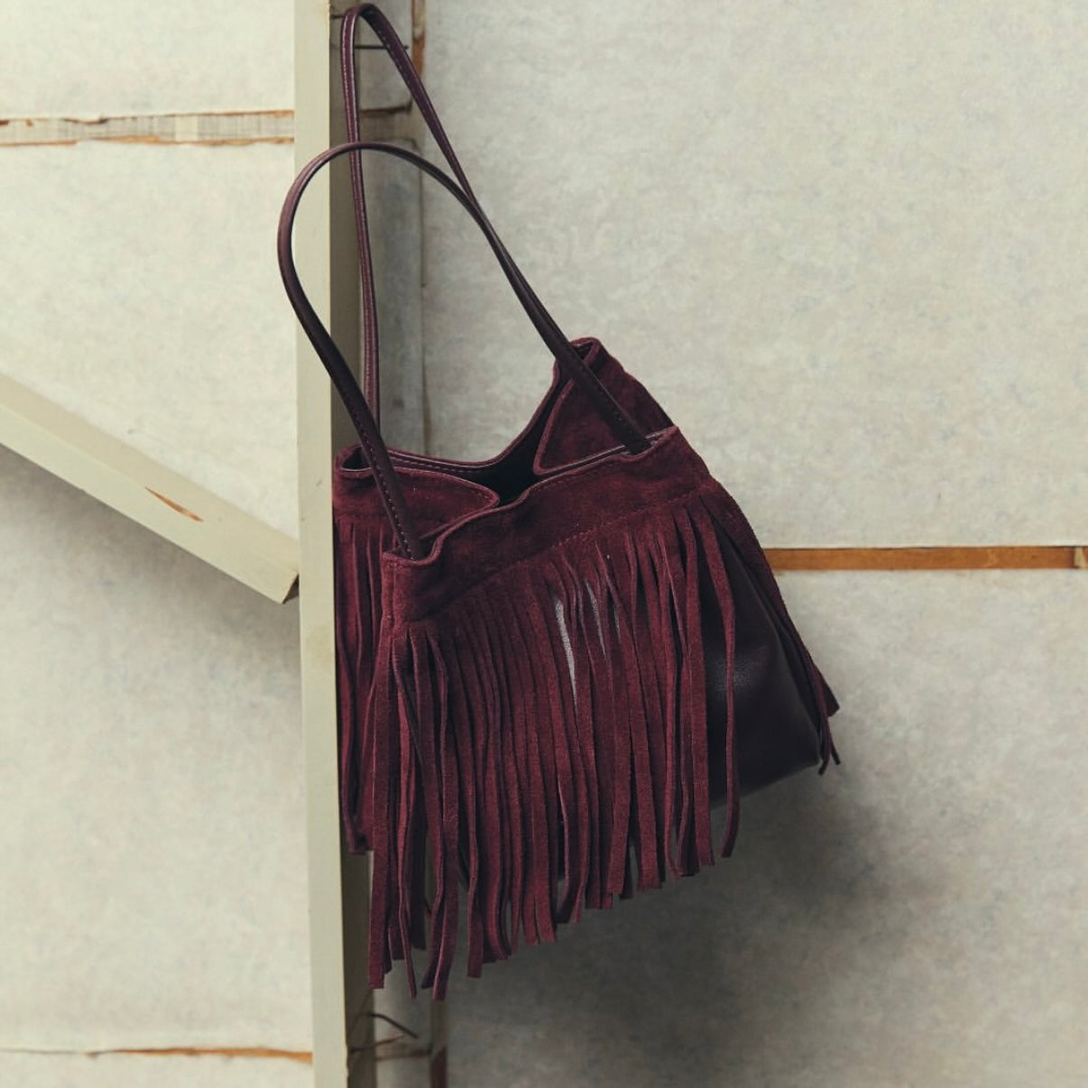 Fringe suede bag